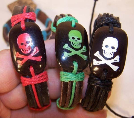 Wholesale SKULL X BONE LEATHER BRACELETS (Sold by the PIECE OR dozen) CLOSEOUT AS LOW AS 75 CENTS EA